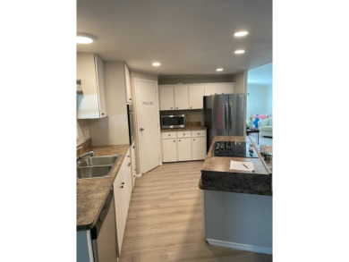 TIRED OF SNOW,ICE AND COLD, TRADE IT IN FOR SUN,WARM AND WHITE on Del Tura Golf and Country Club in Florida - for sale on GolfHomes.com, golf home, golf lot