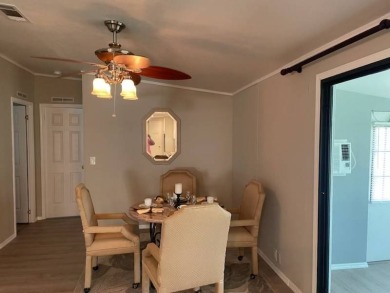 TIRED OF SNOW,ICE AND COLD, TRADE IT IN FOR SUN,WARM AND WHITE on Del Tura Golf and Country Club in Florida - for sale on GolfHomes.com, golf home, golf lot