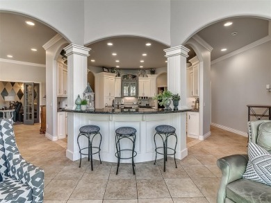 Located in Oakdale Schools, this thoughtfully designed home sits on River Oaks Golf Club in Oklahoma - for sale on GolfHomes.com, golf home, golf lot