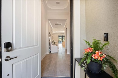 Under contract-accepting backup offers. Stunning Maria Model on Sarasota National Golf Club in Florida - for sale on GolfHomes.com, golf home, golf lot