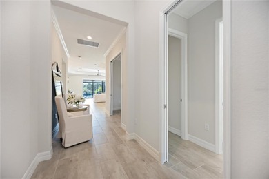 Under contract-accepting backup offers. Stunning Maria Model on Sarasota National Golf Club in Florida - for sale on GolfHomes.com, golf home, golf lot