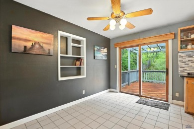 Welcome home to this spacious and full-of-character 5-bedroom on Meadowbrook Golf Course in South Dakota - for sale on GolfHomes.com, golf home, golf lot