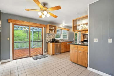 Welcome home to this spacious and full-of-character 5-bedroom on Meadowbrook Golf Course in South Dakota - for sale on GolfHomes.com, golf home, golf lot