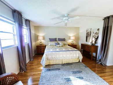 EXPANSIVE GOLF/WATER/CLUBHOUSE VIEW from this Large LUXURY MODEL on Wynmoor Golf Course in Florida - for sale on GolfHomes.com, golf home, golf lot