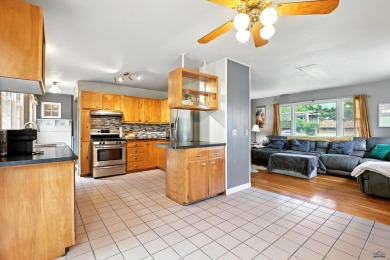 Welcome home to this spacious and full-of-character 5-bedroom on Meadowbrook Golf Course in South Dakota - for sale on GolfHomes.com, golf home, golf lot