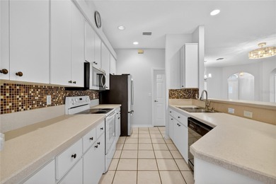 Welcome home to this lovely 3 Bed 2 Bath home in your Gated on Monarch At Royal Highlands in Florida - for sale on GolfHomes.com, golf home, golf lot