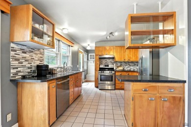 Welcome home to this spacious and full-of-character 5-bedroom on Meadowbrook Golf Course in South Dakota - for sale on GolfHomes.com, golf home, golf lot