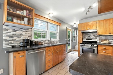 Welcome home to this spacious and full-of-character 5-bedroom on Meadowbrook Golf Course in South Dakota - for sale on GolfHomes.com, golf home, golf lot