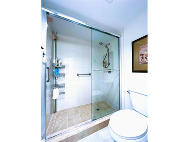 EXPANSIVE GOLF/WATER/CLUBHOUSE VIEW from this Large LUXURY MODEL on Wynmoor Golf Course in Florida - for sale on GolfHomes.com, golf home, golf lot