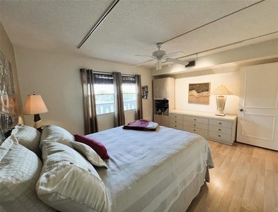 EXPANSIVE GOLF/WATER/CLUBHOUSE VIEW from this Large LUXURY MODEL on Wynmoor Golf Course in Florida - for sale on GolfHomes.com, golf home, golf lot