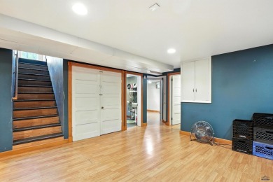 Welcome home to this spacious and full-of-character 5-bedroom on Meadowbrook Golf Course in South Dakota - for sale on GolfHomes.com, golf home, golf lot