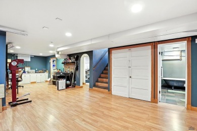Welcome home to this spacious and full-of-character 5-bedroom on Meadowbrook Golf Course in South Dakota - for sale on GolfHomes.com, golf home, golf lot