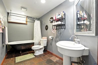 Welcome home to this spacious and full-of-character 5-bedroom on Meadowbrook Golf Course in South Dakota - for sale on GolfHomes.com, golf home, golf lot
