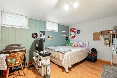 Welcome home to this spacious and full-of-character 5-bedroom on Meadowbrook Golf Course in South Dakota - for sale on GolfHomes.com, golf home, golf lot