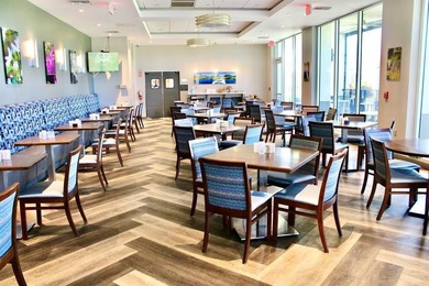 EXPANSIVE GOLF/WATER/CLUBHOUSE VIEW from this Large LUXURY MODEL on Wynmoor Golf Course in Florida - for sale on GolfHomes.com, golf home, golf lot