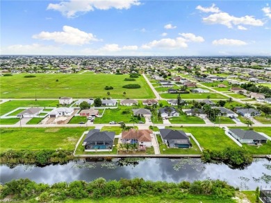 Step into your slice of paradise at 1004 NW 12th Ave, Cape Coral on Burnt Store Golf Club in Florida - for sale on GolfHomes.com, golf home, golf lot