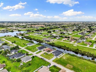 Step into your slice of paradise at 1004 NW 12th Ave, Cape Coral on Burnt Store Golf Club in Florida - for sale on GolfHomes.com, golf home, golf lot
