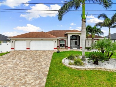 Step into your slice of paradise at 1004 NW 12th Ave, Cape Coral on Burnt Store Golf Club in Florida - for sale on GolfHomes.com, golf home, golf lot