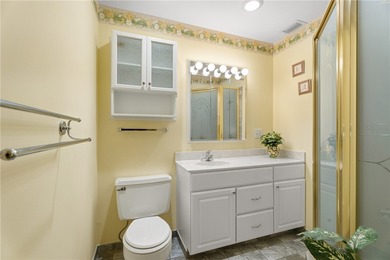 Turnkey 2BR/2BA corner condo in Vista Royale, a desirable 55+ on The American Golf Club in Florida - for sale on GolfHomes.com, golf home, golf lot