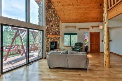 This classic Columbine Lake mountain home is a 4BR/ 4BA with on Grand Lake Golf Course in Colorado - for sale on GolfHomes.com, golf home, golf lot