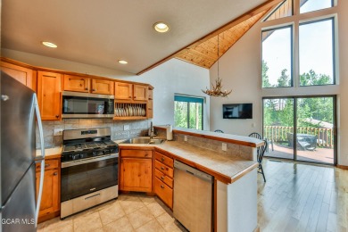 This classic Columbine Lake mountain home is a 4BR/ 4BA with on Grand Lake Golf Course in Colorado - for sale on GolfHomes.com, golf home, golf lot