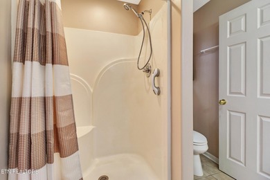 Welcome home to this inviting 3-bedroom, 2-bath split-bedroom on Druid Hills Golf Club in Tennessee - for sale on GolfHomes.com, golf home, golf lot