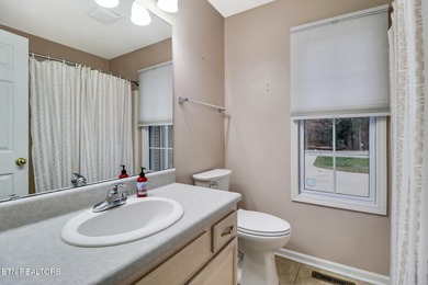 Welcome home to this inviting 3-bedroom, 2-bath split-bedroom on Druid Hills Golf Club in Tennessee - for sale on GolfHomes.com, golf home, golf lot