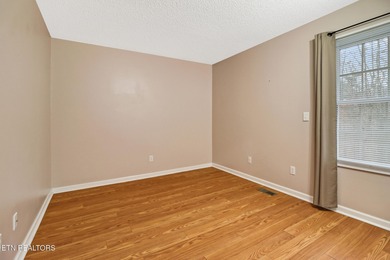 Welcome home to this inviting 3-bedroom, 2-bath split-bedroom on Druid Hills Golf Club in Tennessee - for sale on GolfHomes.com, golf home, golf lot