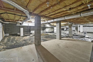 Welcome home to this inviting 3-bedroom, 2-bath split-bedroom on Druid Hills Golf Club in Tennessee - for sale on GolfHomes.com, golf home, golf lot