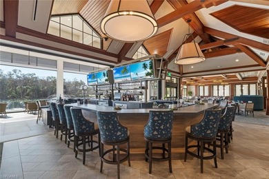 Enjoy golf on the award winning Eagle Creek golf course from day on Eagle Creek Golf and Country Club in Florida - for sale on GolfHomes.com, golf home, golf lot