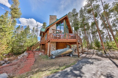 This classic Columbine Lake mountain home is a 4BR/ 4BA with on Grand Lake Golf Course in Colorado - for sale on GolfHomes.com, golf home, golf lot