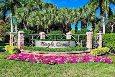Enjoy golf on the award winning Eagle Creek golf course from day on Eagle Creek Golf and Country Club in Florida - for sale on GolfHomes.com, golf home, golf lot