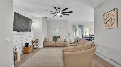 Welcome to 4565 Fairway Oaks Drive - a stunning 4-bedroom on Imperial Lakes Country Club in Florida - for sale on GolfHomes.com, golf home, golf lot
