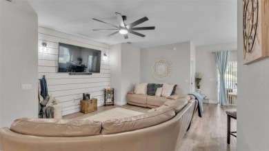 Welcome to 4565 Fairway Oaks Drive - a stunning 4-bedroom on Imperial Lakes Country Club in Florida - for sale on GolfHomes.com, golf home, golf lot