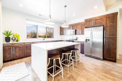 This immaculate single-level home is nestled in the highly on Entrada at Snow Canyon in Utah - for sale on GolfHomes.com, golf home, golf lot
