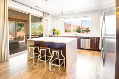 This immaculate single-level home is nestled in the highly on Entrada at Snow Canyon in Utah - for sale on GolfHomes.com, golf home, golf lot