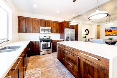 This immaculate single-level home is nestled in the highly on Entrada at Snow Canyon in Utah - for sale on GolfHomes.com, golf home, golf lot