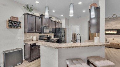 Welcome to 4565 Fairway Oaks Drive - a stunning 4-bedroom on Imperial Lakes Country Club in Florida - for sale on GolfHomes.com, golf home, golf lot