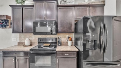 Welcome to 4565 Fairway Oaks Drive - a stunning 4-bedroom on Imperial Lakes Country Club in Florida - for sale on GolfHomes.com, golf home, golf lot