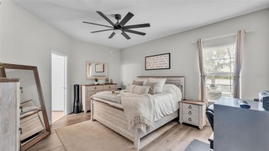 Welcome to 4565 Fairway Oaks Drive - a stunning 4-bedroom on Imperial Lakes Country Club in Florida - for sale on GolfHomes.com, golf home, golf lot