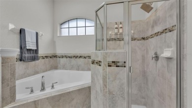 Welcome to 4565 Fairway Oaks Drive - a stunning 4-bedroom on Imperial Lakes Country Club in Florida - for sale on GolfHomes.com, golf home, golf lot