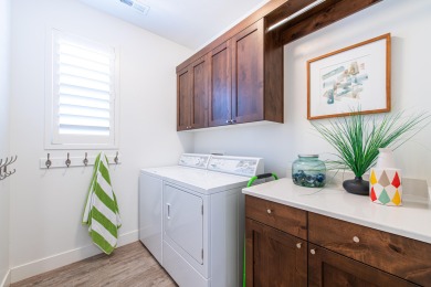 This immaculate single-level home is nestled in the highly on Entrada at Snow Canyon in Utah - for sale on GolfHomes.com, golf home, golf lot