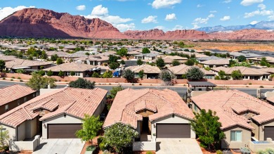 This immaculate single-level home is nestled in the highly on Entrada at Snow Canyon in Utah - for sale on GolfHomes.com, golf home, golf lot