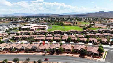 This immaculate single-level home is nestled in the highly on Entrada at Snow Canyon in Utah - for sale on GolfHomes.com, golf home, golf lot