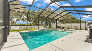 Welcome to 4565 Fairway Oaks Drive - a stunning 4-bedroom on Imperial Lakes Country Club in Florida - for sale on GolfHomes.com, golf home, golf lot