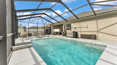 Welcome to 4565 Fairway Oaks Drive - a stunning 4-bedroom on Imperial Lakes Country Club in Florida - for sale on GolfHomes.com, golf home, golf lot