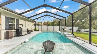 Welcome to 4565 Fairway Oaks Drive - a stunning 4-bedroom on Imperial Lakes Country Club in Florida - for sale on GolfHomes.com, golf home, golf lot