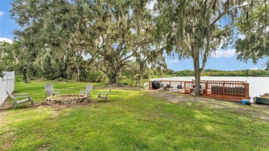 Welcome to 4565 Fairway Oaks Drive - a stunning 4-bedroom on Imperial Lakes Country Club in Florida - for sale on GolfHomes.com, golf home, golf lot