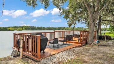Welcome to 4565 Fairway Oaks Drive - a stunning 4-bedroom on Imperial Lakes Country Club in Florida - for sale on GolfHomes.com, golf home, golf lot