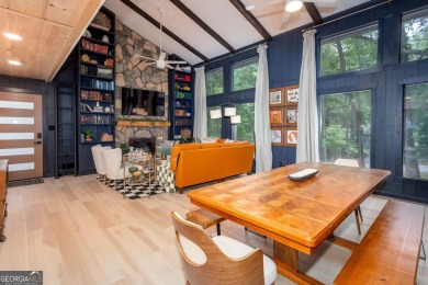 Nestled on a desirable corner lot near the North Gate, this on The Highlands Course at Lake Arrowhead in Georgia - for sale on GolfHomes.com, golf home, golf lot